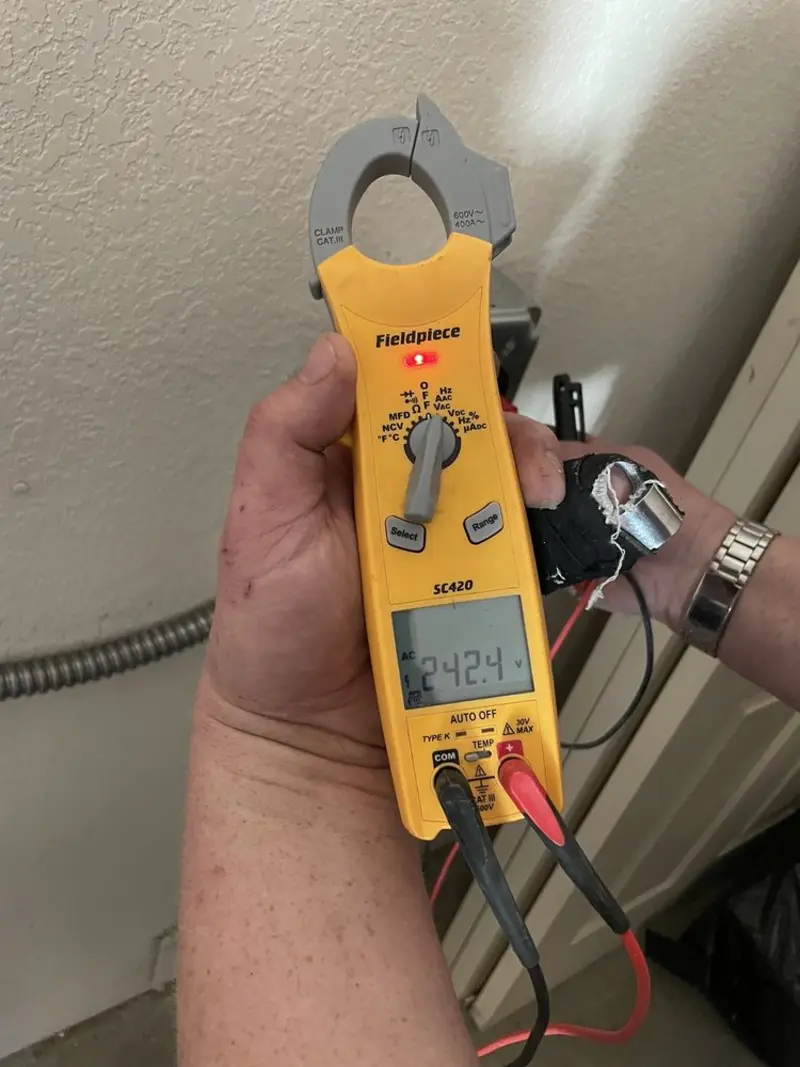 Voltage testing with clamp meter during Electrical Installation Services in Placerville